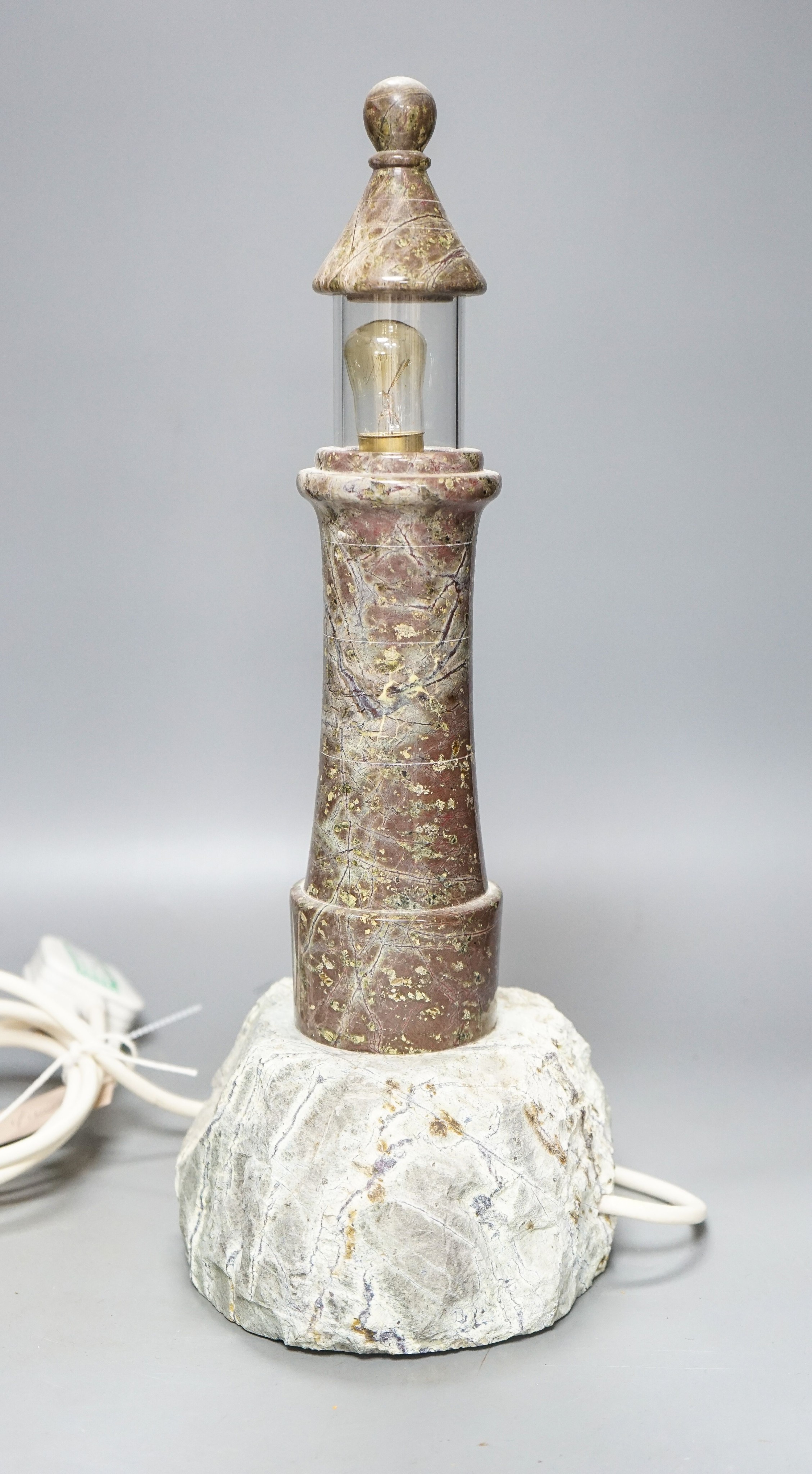 A Cornish serpentine ‘lighthouse’ table lamp 42cm